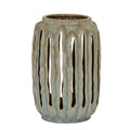Ceramic vase with textured design on a white background