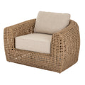 Wicker armchair with beige cushion on a white background