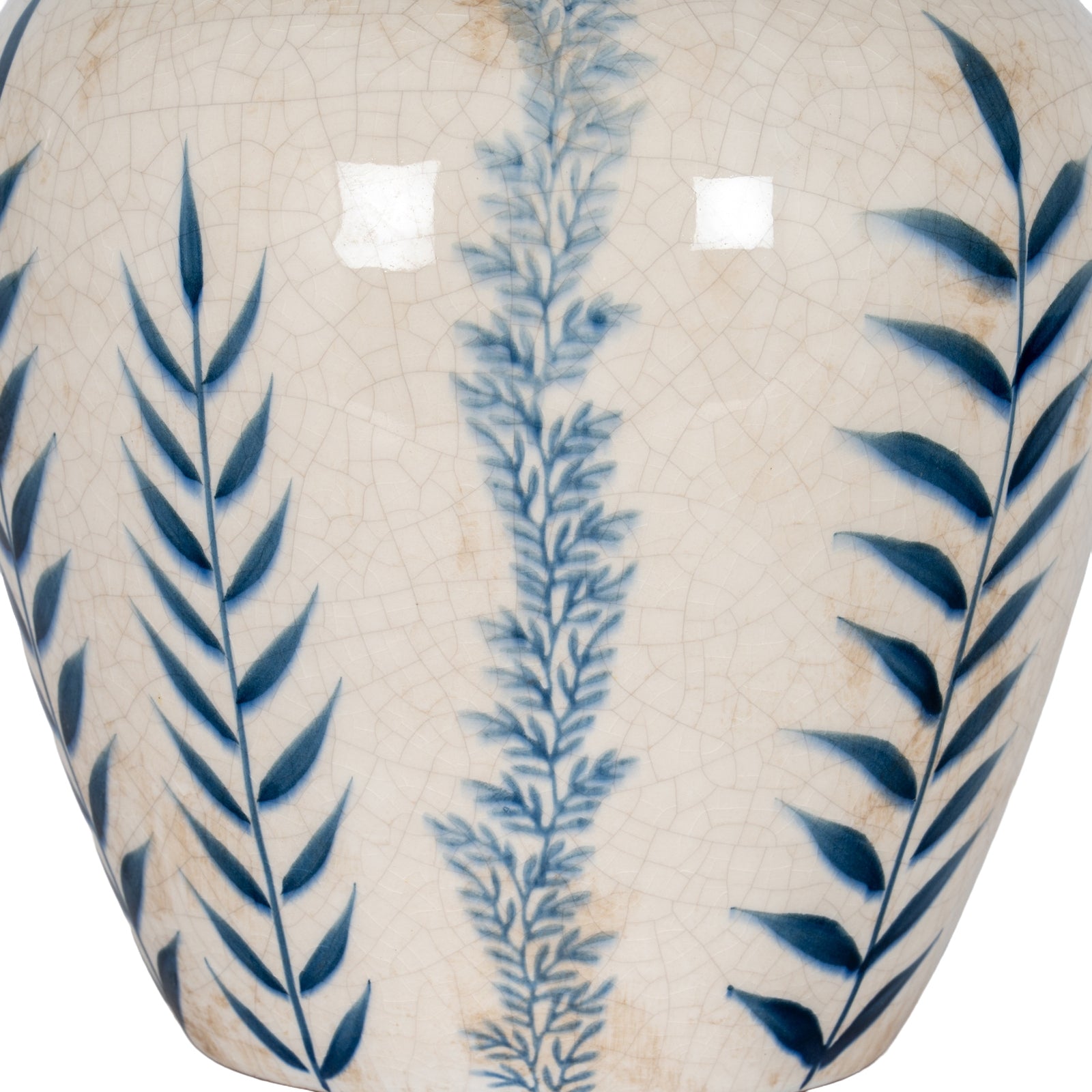 Ceramic vase with blue leaf patterns on a beige background